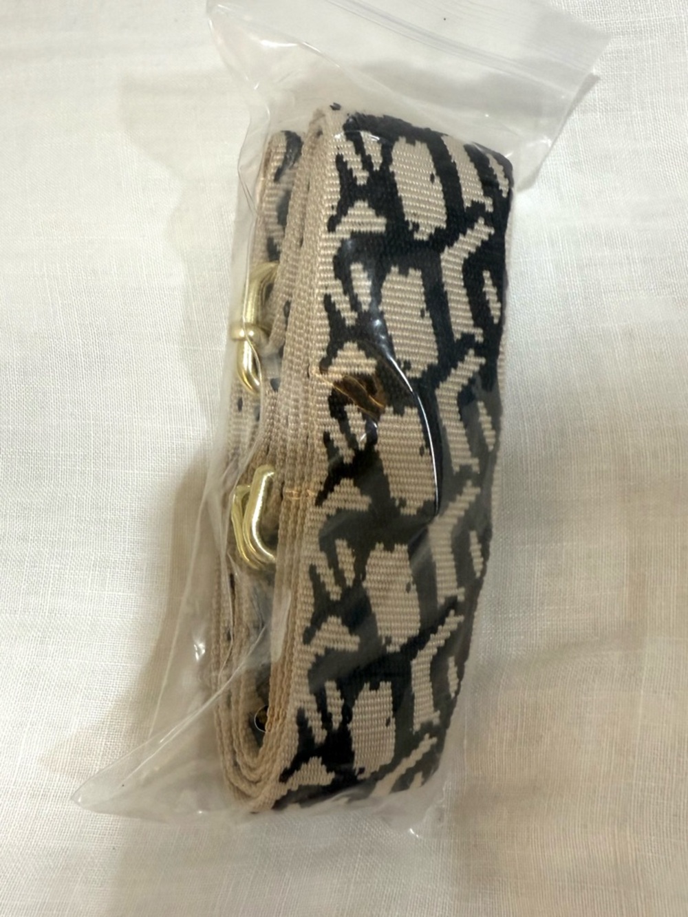 Adjustable Beige and Black Jacquard Webbing Strap with Gold Hardware
